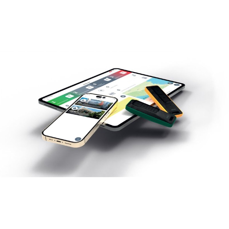 FAAC XT2 FDS 787017 One Green and one yellow remote leaning on tablet and phone